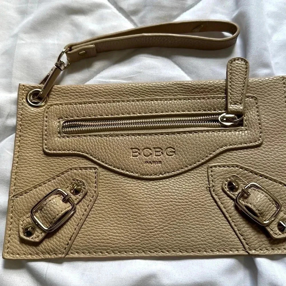BCBG Paris small faux leather wristlet